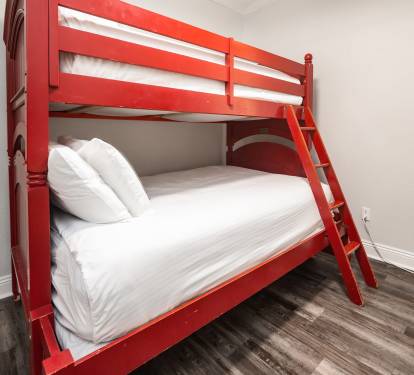 Bright bunk bed setup adding a fun, space-saving sleeping option for guests.