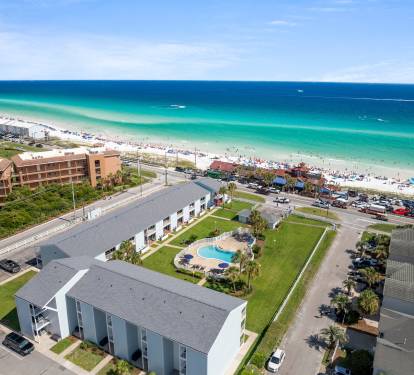 Spectacular location and views form our 3rd story condo in a small complex - GREAT location!  Walk to dining and beach!