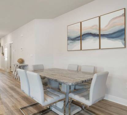 Main Kitchen: Comfortable dining space with a 6-seater table for family and friends.