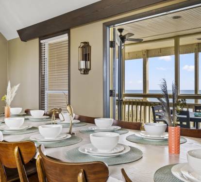 Indulge in the beauty and elegance of the decor while dining with friends and loved ones in this independent, bright dining area that comfortably seats 14.