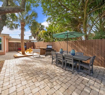 Grill, dine, and relax without moving. The patio connects your gas
grill, outdoor dining table, pool deck, and lounge seating in one seamless outdoor living zone.