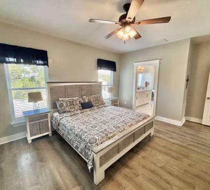 Master bedroom with king bed and flat screen TV