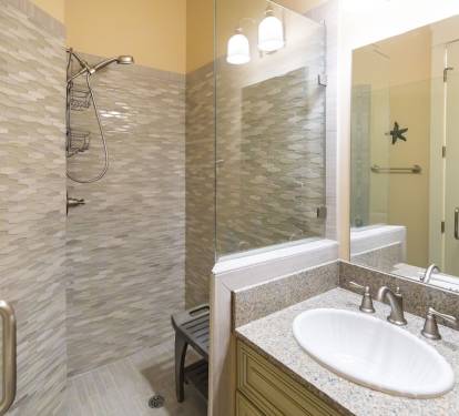 Full bath #3 downstairs with walk in shower, teakseat for those who prefer  to sit.  