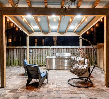 Outdoor Kitchen with Lighting at Night