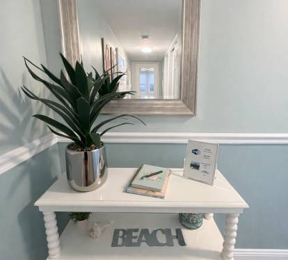 Coastal decor throughout condo.