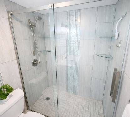 Airy walk-in shower designed for a fresh, spa-like feel.