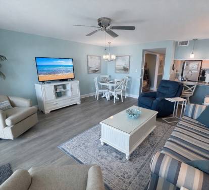 Dining area and Living Room with 60" LG television. 