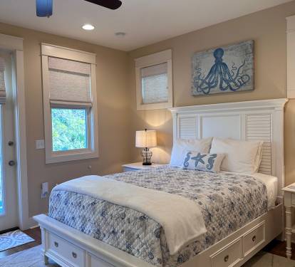 Bedroom #2 upstairs, features a Queen & a Full size bed.  Beds have under bed clothes drawers for your convenience. 