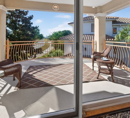 Covered outdoor dining area ideal for laid-back meals and conversations.