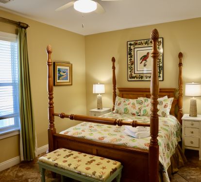 Queen bedroom facing the road