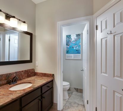  Bathroom with granite vanity and modern fixtures