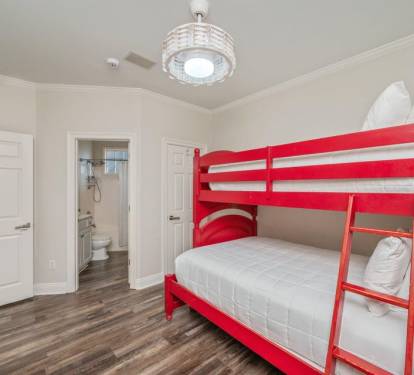 Sturdy bunk beds w/ clean lines, ideal for kids or shared stays.