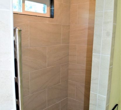 walk inshower in master bedroom with grab bars
