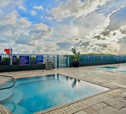 Relax in the spacious hot tub.