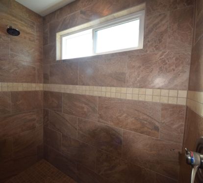 huge walk in shower with handle on opposite wall o