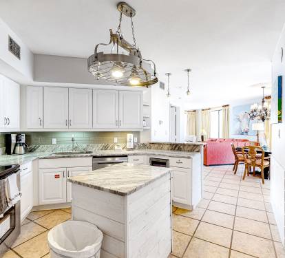 Kitchen with the perspective to the Dining and Living areas.