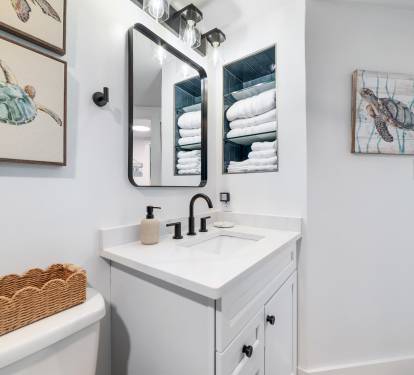 Guest Bathroom with niche for toiletry bags