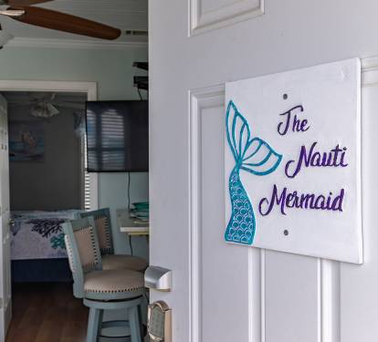 Step inside The Nauti Mermaid and get your first glimpse of the space. The entry opens directly into the condo, setting the tone for a clean, well-cared-for retreat just moments from the beach.