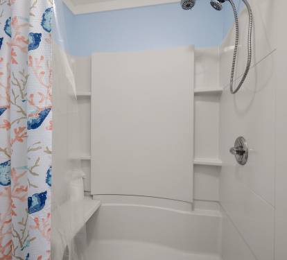 Master Bathroom with low entry access and shower seat