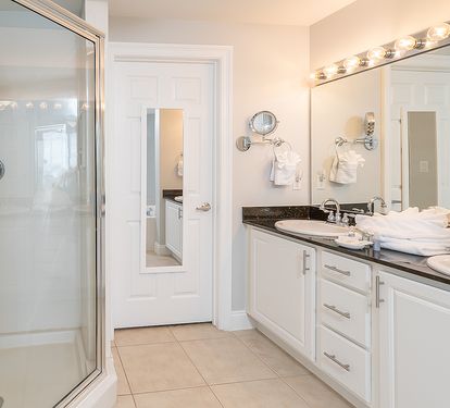 Primary Bathroom with double sinks and walk-in shower