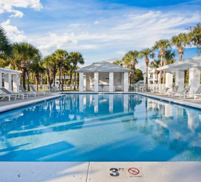 Straight out the front door and just a short walk down to Osprey Circle, this larger neighborhood pool offers lounge seating, beautiful landscaping, and a bath/changing area—often a quiet, easy getaway just steps from the house when you want a little spac