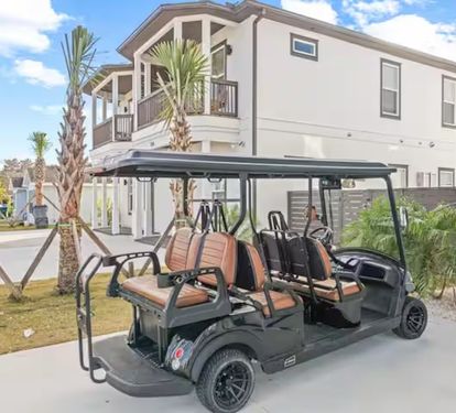 A golf cart is available for rent at the property