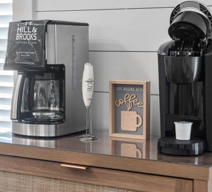 But First - Coffee!!   Starting your day with coffee your way is easy.  Whether you want the custom brew in a French Press with creamer frothed just the way you like, a good pot of drip coffee, or the convenience of the pods, it's here.