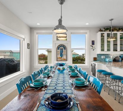 Dining table seats 10, peninsula seats 6 