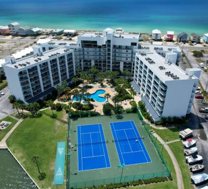 Resort-style amenities without resort fees. We offer a clean, beautiful pool and hot tub, as well as pickle ball courts, shuffle board and two fishing piers. As if that's not enough, as you can see, the gulf is right there across the street. IKR!