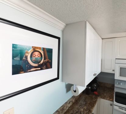 You'll find art throughout our condo. This piece is in the kitchen.