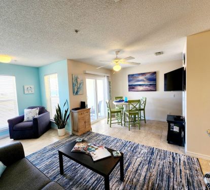 Sitting area with Comfy Couch and TV