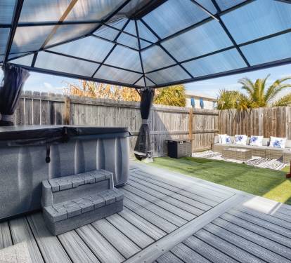 Enjoy the hot tub at the backyard and gather with your friends