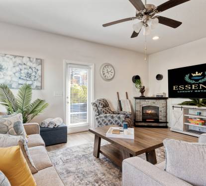 Bright, modern open-concept home with a cozy living area, stylish furnishings, and fully equipped kitchen. Enjoy comfortable seating, dining space, and natural light perfect for relaxing, working remotely, or hosting a memorable stay.