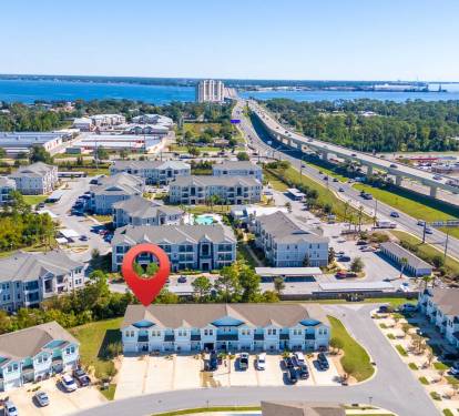 Stunning community amenities featuring a resort-style pool and scenic lake with fountain views. Relax poolside, enjoy the sunshine, or take in the peaceful surroundings perfect for a refreshing getaway.