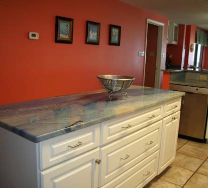 island in kitchen with countertops imported from Italy