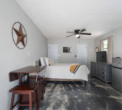  Queen Bed, dresser, closet. Dining Table, Mini Fridge, Bathroom &amp; TV