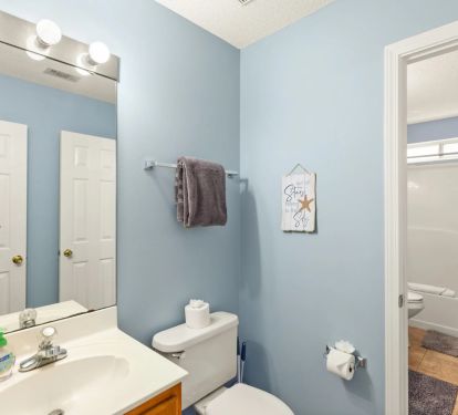  Downstairs Half Bath (Connected to the primary suite)