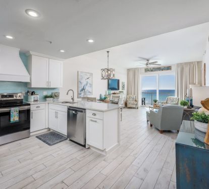 Designer kitchen with custom hood