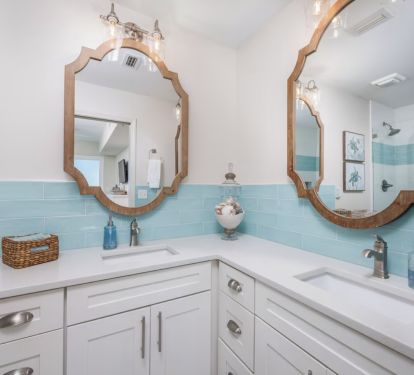 Primary bath with double vanities, custom cabinets and Quartz countertops
