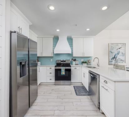 Designer custom cabinetry and Quartz counter tops!