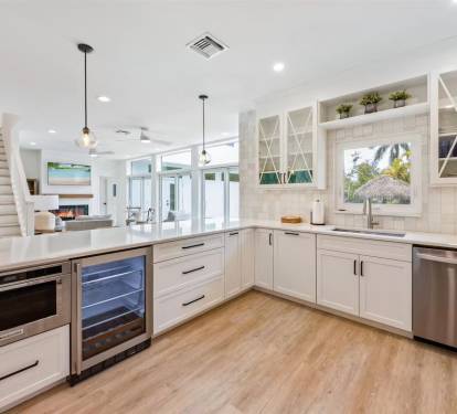 Sirenia By The Sea - chef's kitchen open concept to back second living room