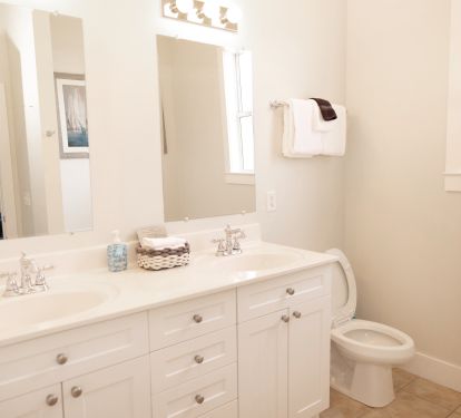 Upstairs Master Suite bath with jetted tub and walk in shower