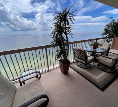 Our lovely balcony enclosed with patio furniture and 3 chairs with cushions for added comfort.