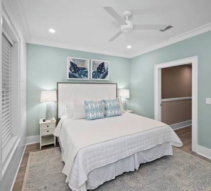 Second floor primary room with king size bed.