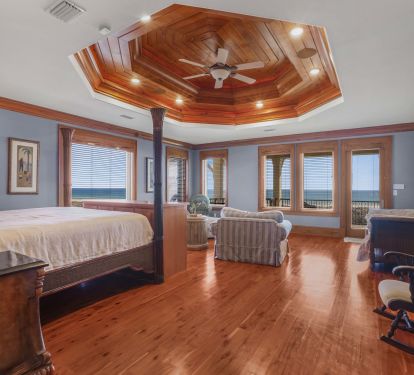 Primary Suite with Corner Views and Balcony Access
