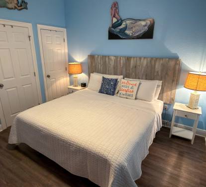 Beach-inspired artwork and seaside décor give this retreat a lighthearted charm that instantly feels like vacation.