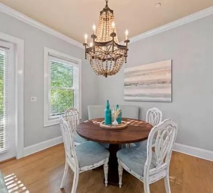 Dining room seating next to kitchen