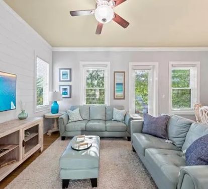 The main living space on the 2nd floor includes kitchen, dining table and another living room.