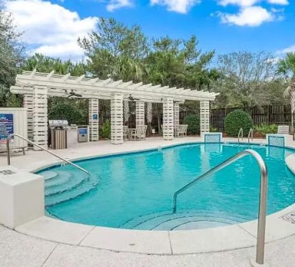 Our end unit enjoys easy access to the pool and patio.