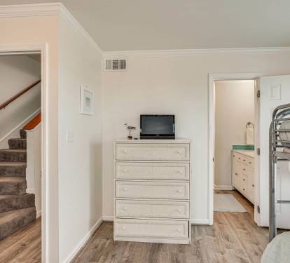 Stairway near bunkroom and bath.